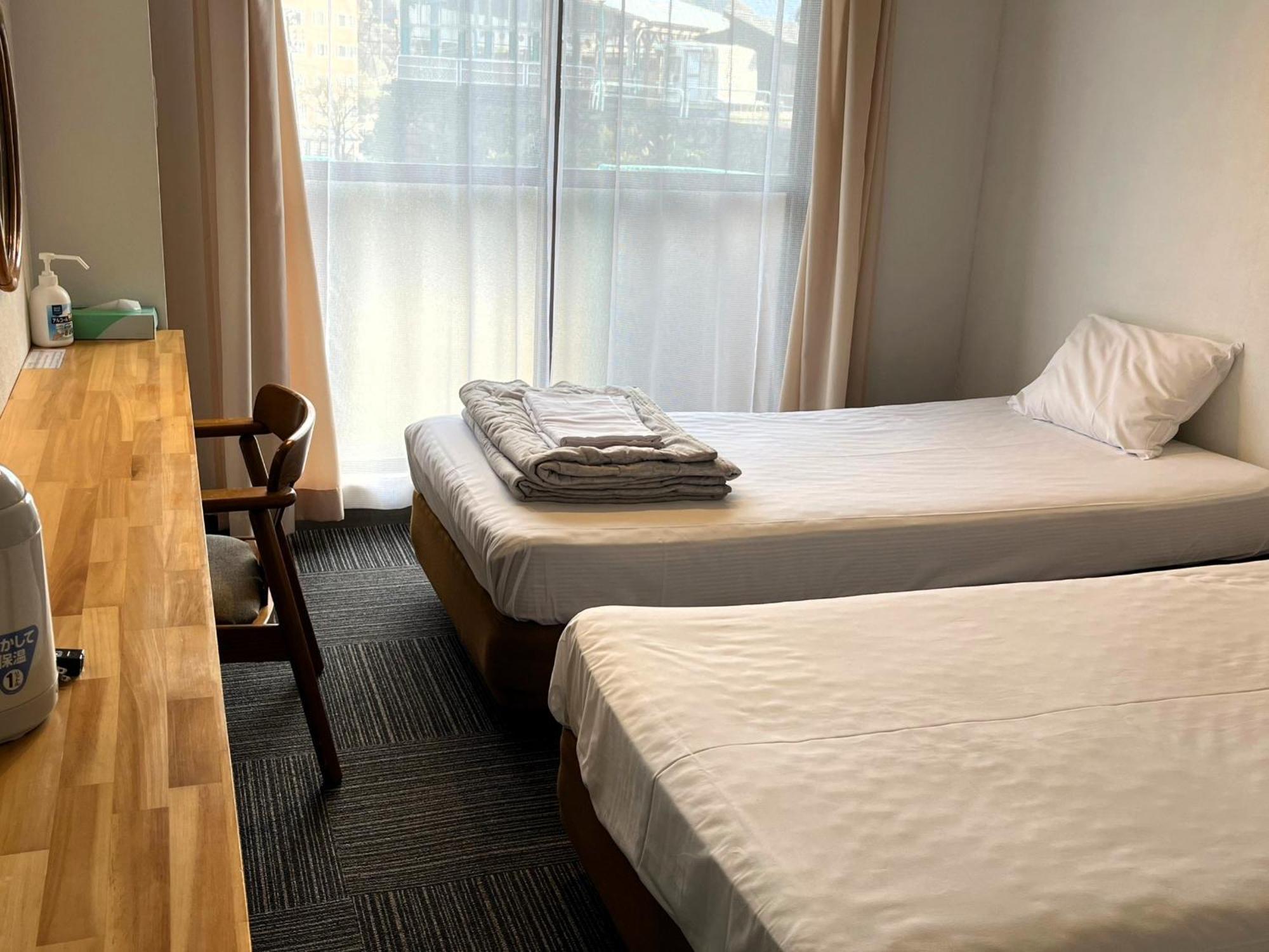 Ishiuchibase Hotell Minamiuonuma Rum bild