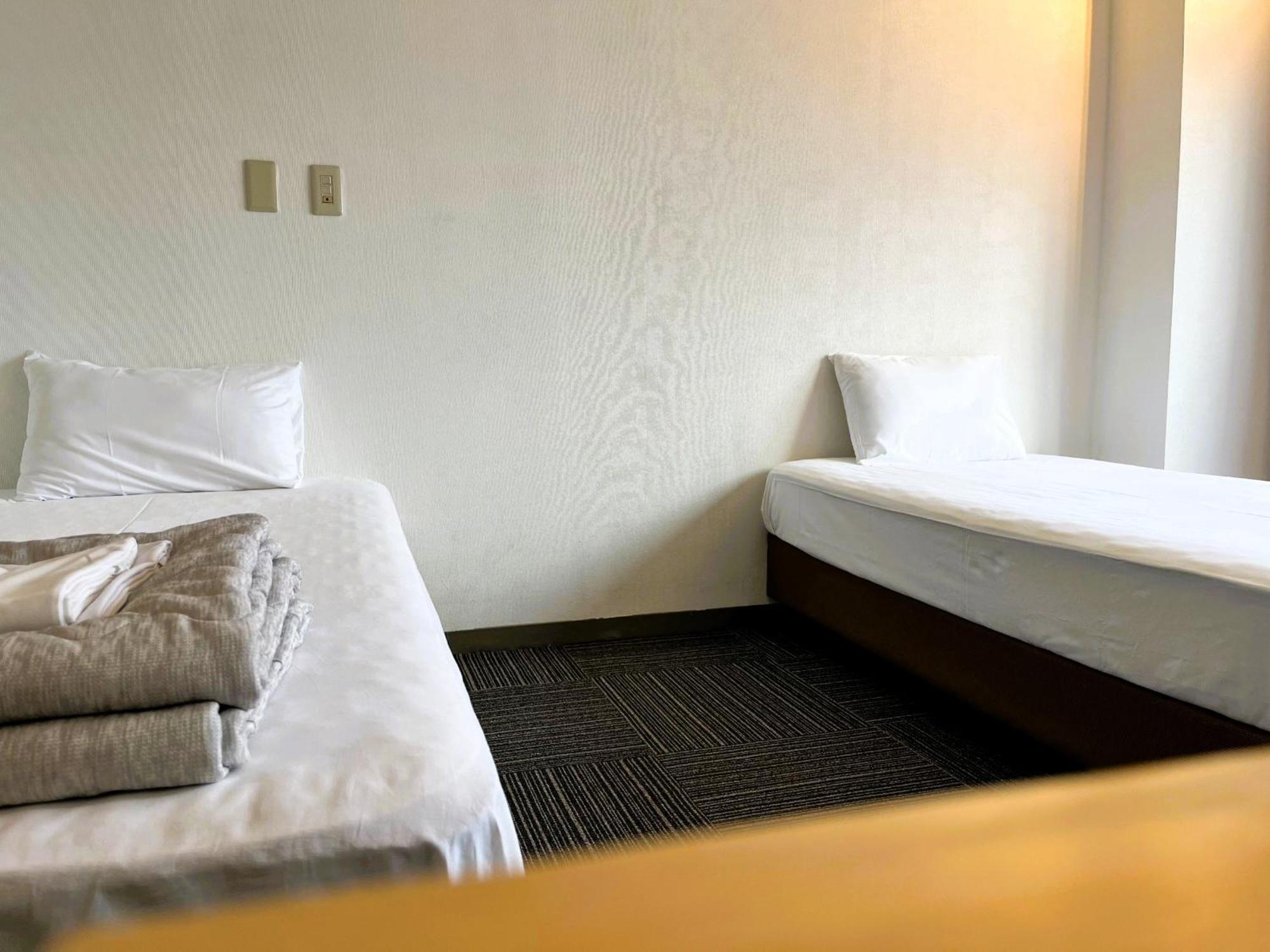 Ishiuchibase Hotell Minamiuonuma Rum bild