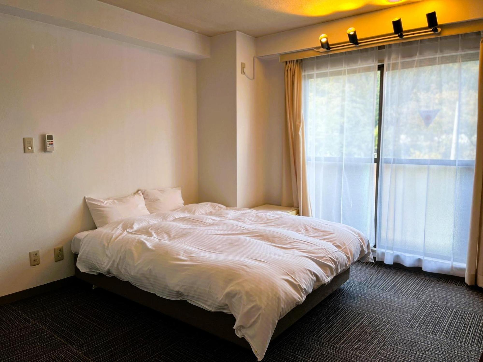 Ishiuchibase Hotell Minamiuonuma Rum bild